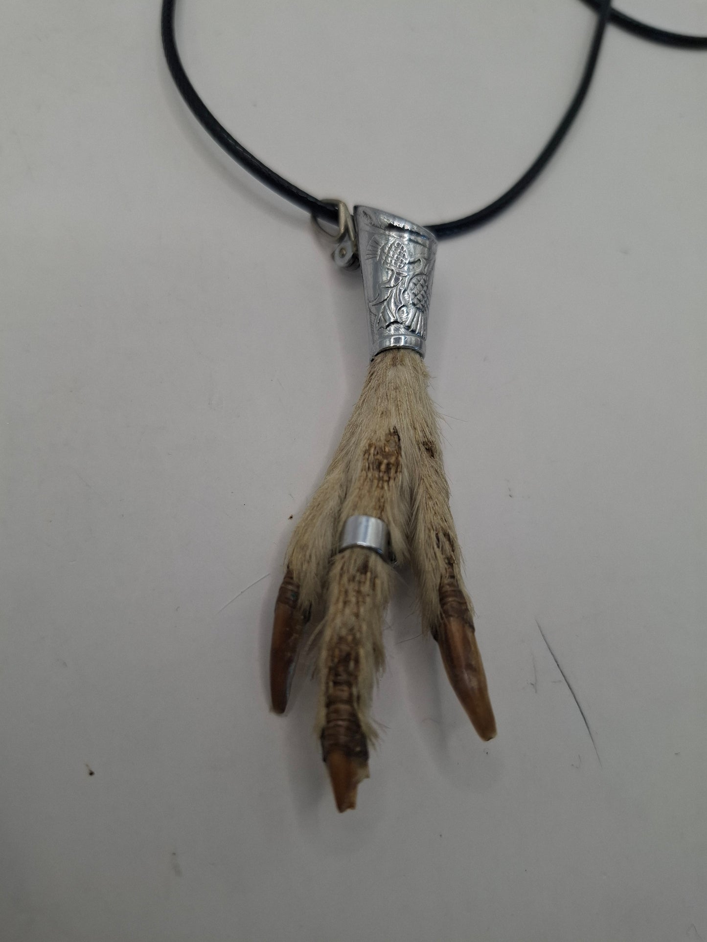 Antique feet necklace