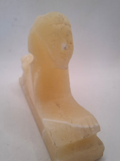 Battered Sphinx Carving
