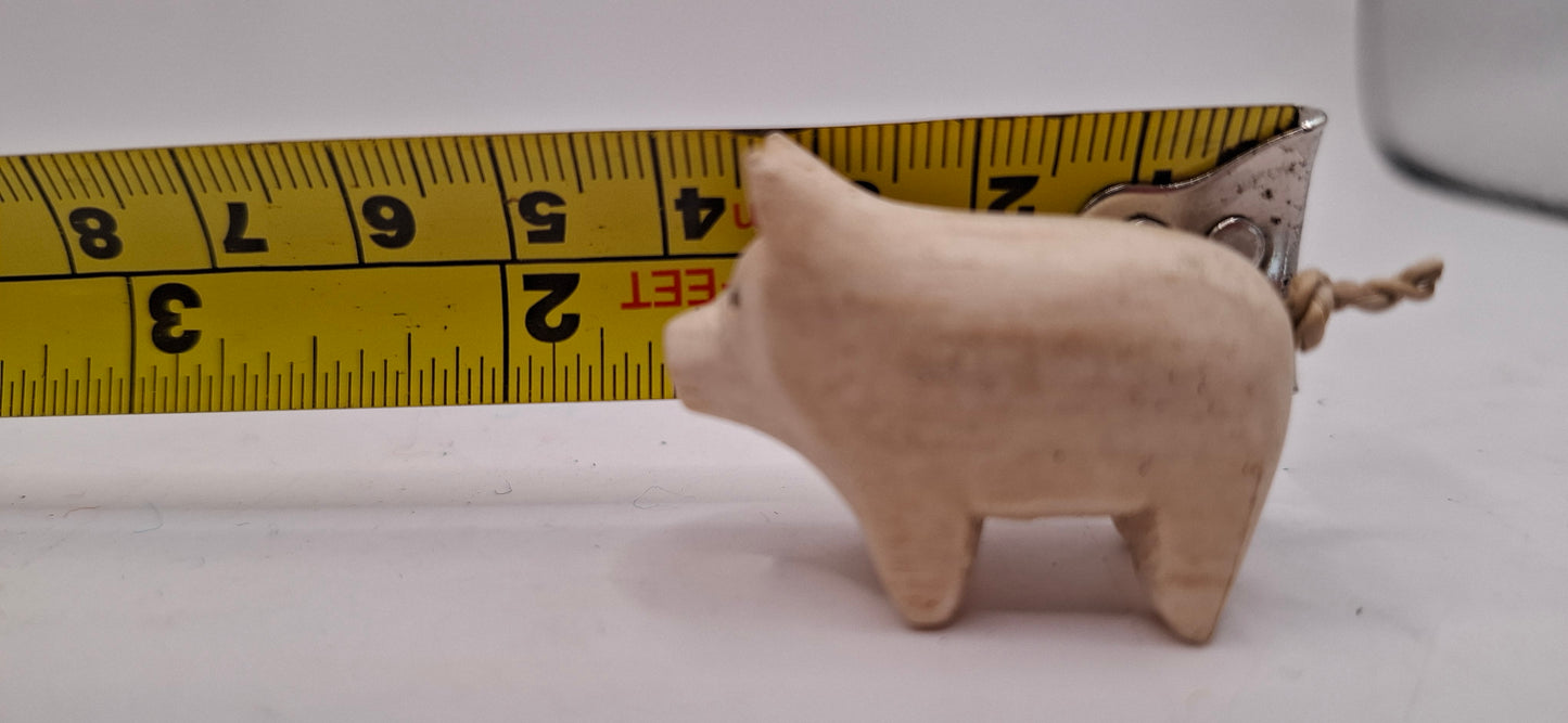 A Tiny Wooden Pig