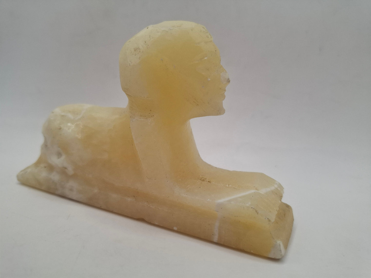 Battered Sphinx Carving