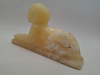 Battered Sphinx Carving